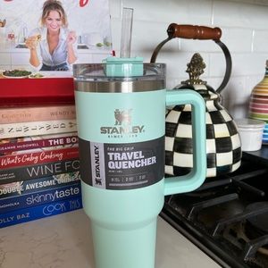 Brand new Stanley 40oz travel quencher in Mint with cover and straw